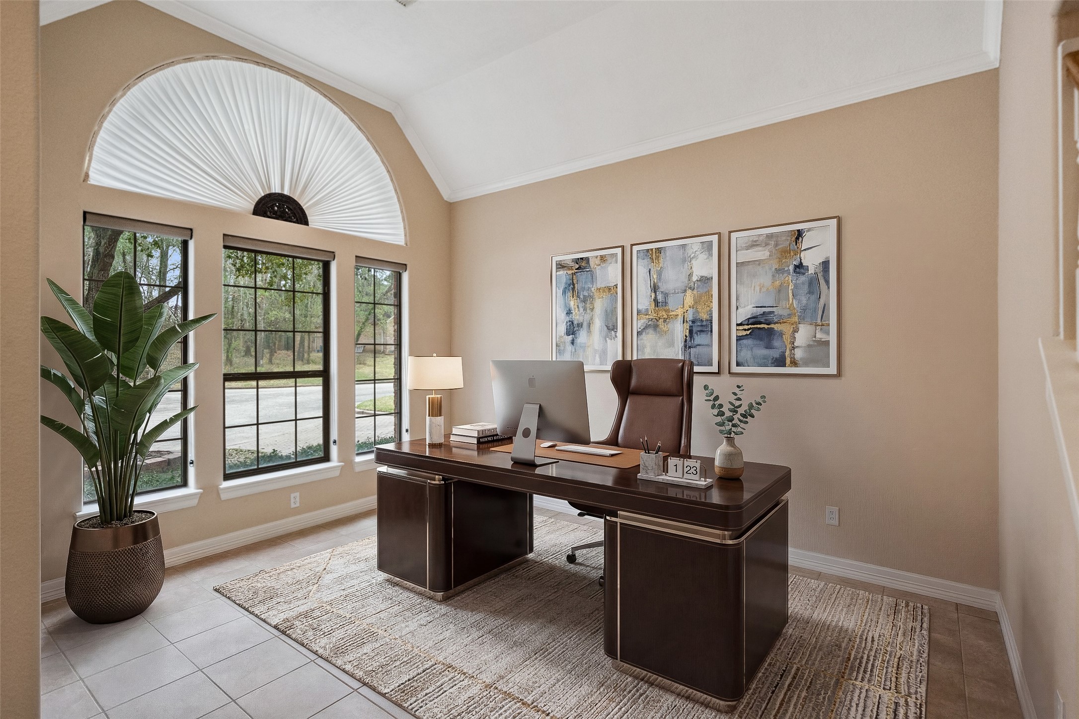 901 Longmire Road, Unit 28 Conroe, TX 77304 - Photo 5 of 31 a living room with furniture a window and potted plants