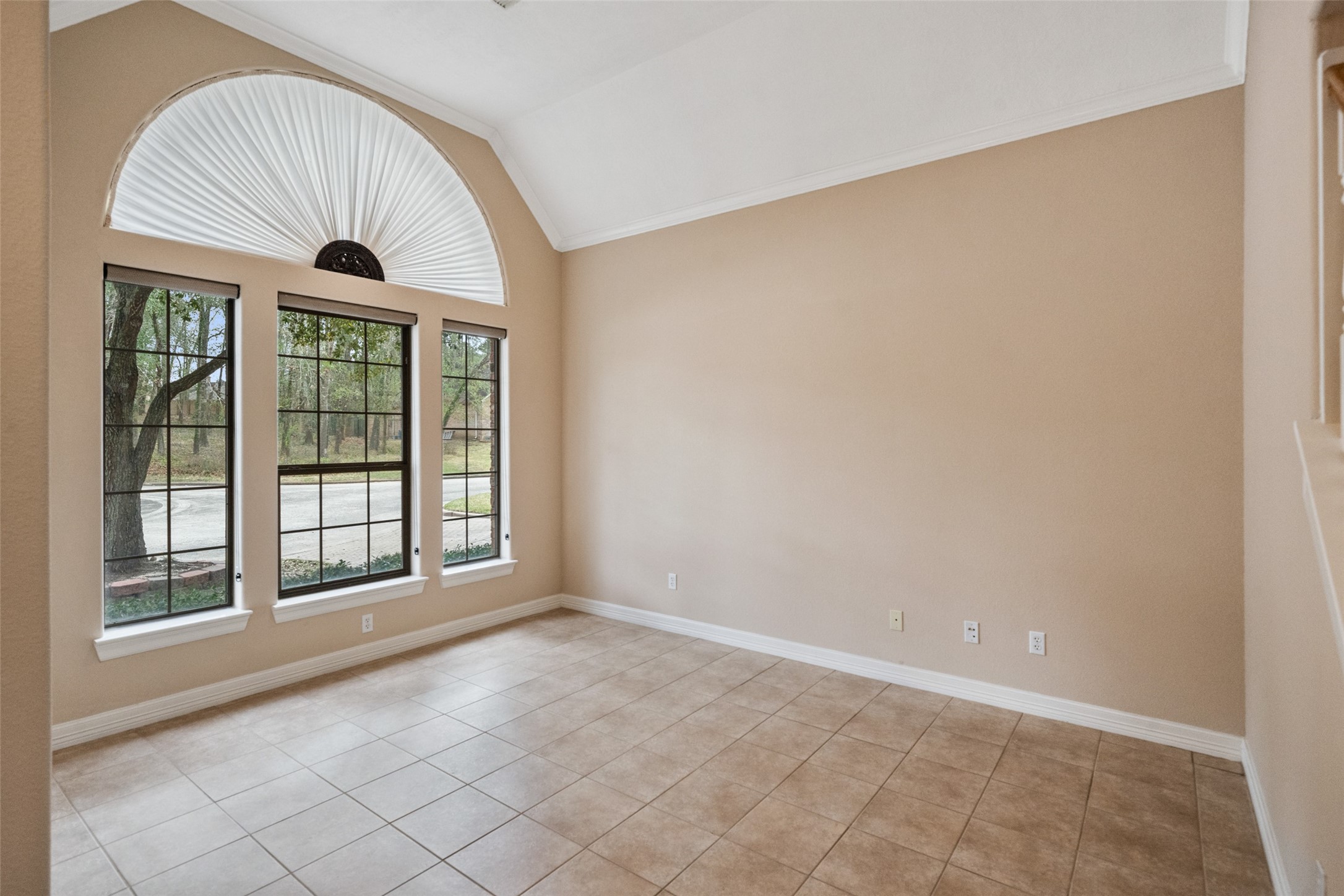 901 Longmire Road, Unit 28 Conroe, TX 77304 - Photo 6 of 31 an empty room with windows