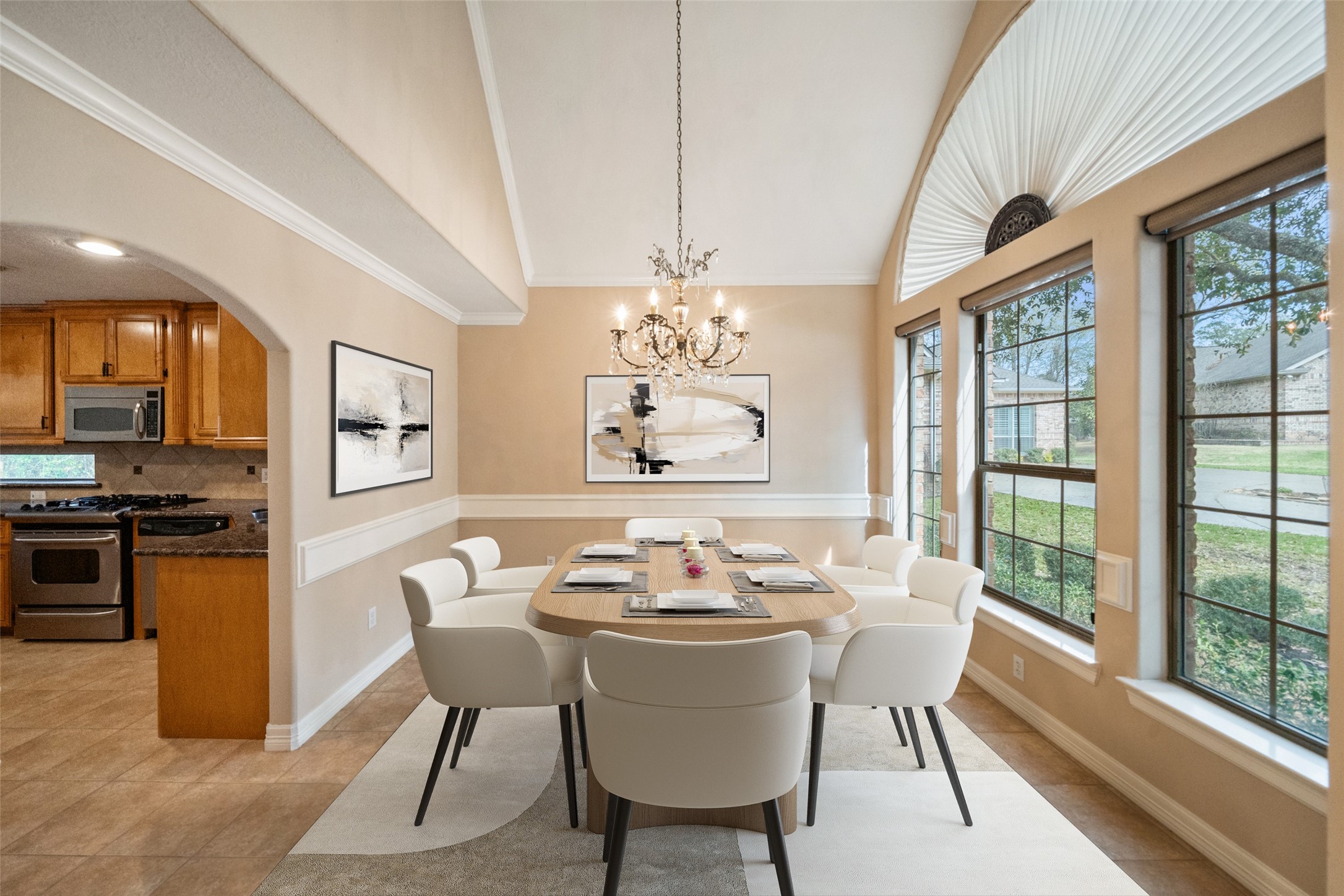 901 Longmire Road, Unit 28 Conroe, TX 77304 - Photo 7 of 31 a dining room with furniture a chandelier and wooden floor