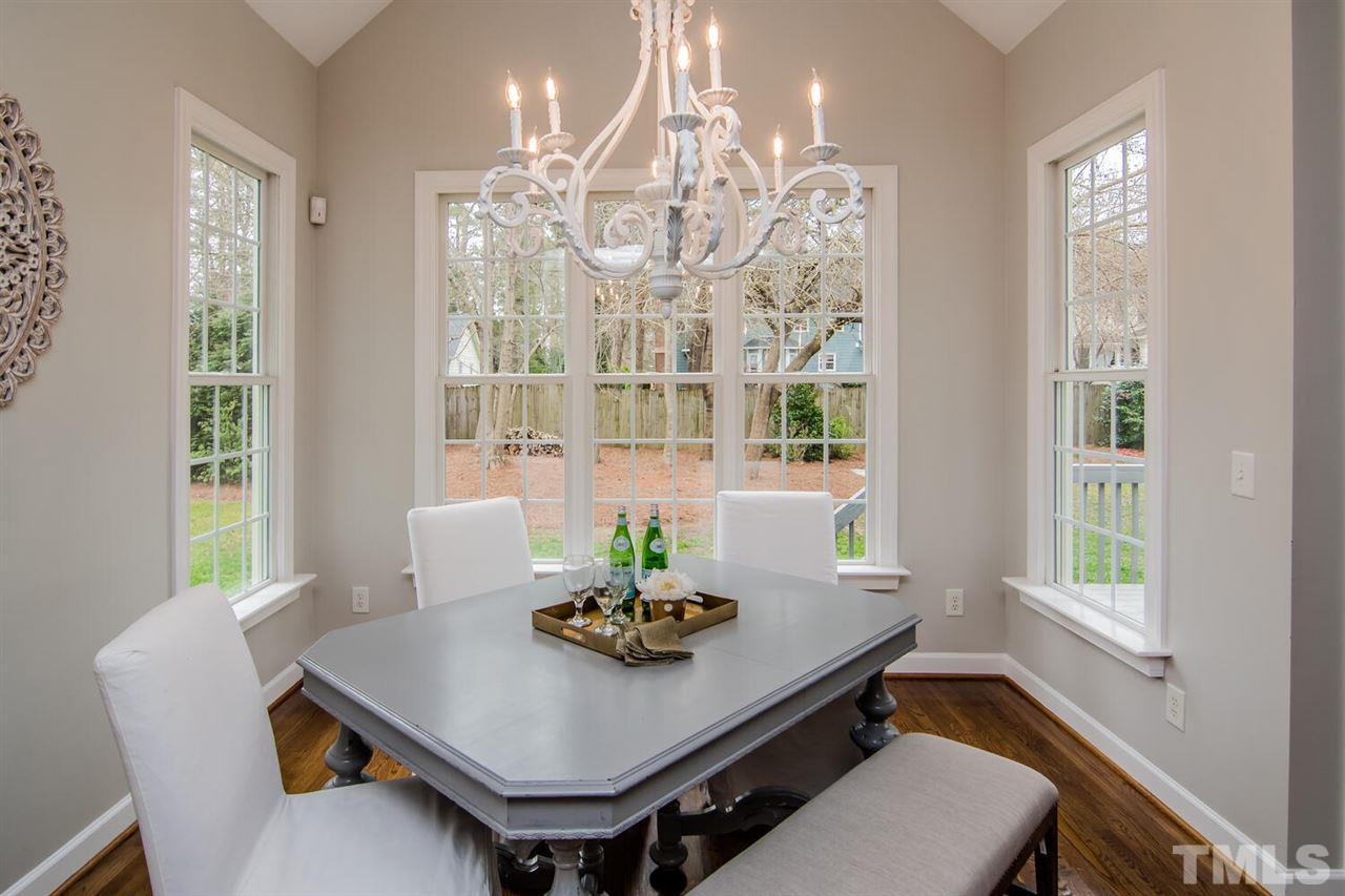 1614 Weatherford Circle Raleigh, NC 27604 - Photo 3 of 12 Overlooking the private yard, the breakfast area is the perfect place for relaxing with a cup of tea or coffee before starting your day!