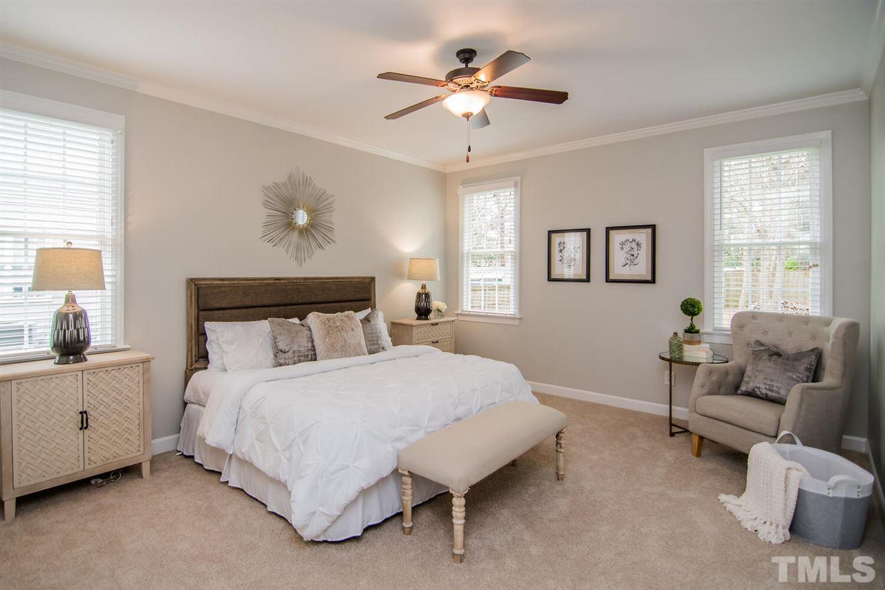 1614 Weatherford Circle Raleigh, NC 27604 - Photo 4 of 12 Private owners suite with NEW CARPET! There's a WALK-IN CLOSET and a nice view of the private yard.