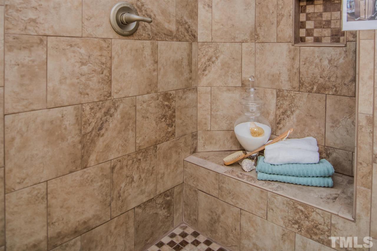 1614 Weatherford Circle Raleigh, NC 27604 - Photo 6 of 12 The owners shower has new glass surround (brushed nickel) on order. It will be installed as soon as it arrives!