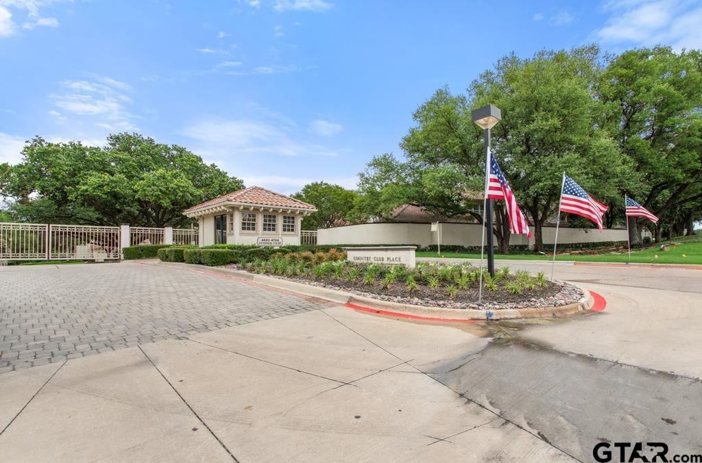 4608 North O'Connor Road Irving, TX 75062 - Photo 11 of 45 a front view of a house with a yard and trees