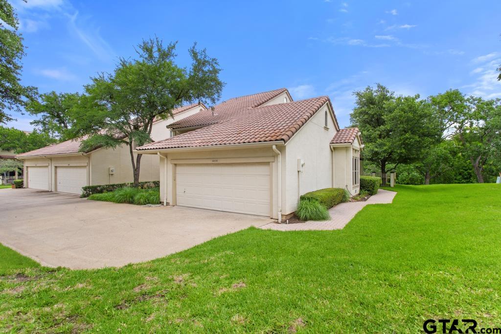 4608 North O'Connor Road Irving, TX 75062 - Photo 30 of 45 a view of a house with a yard and tree