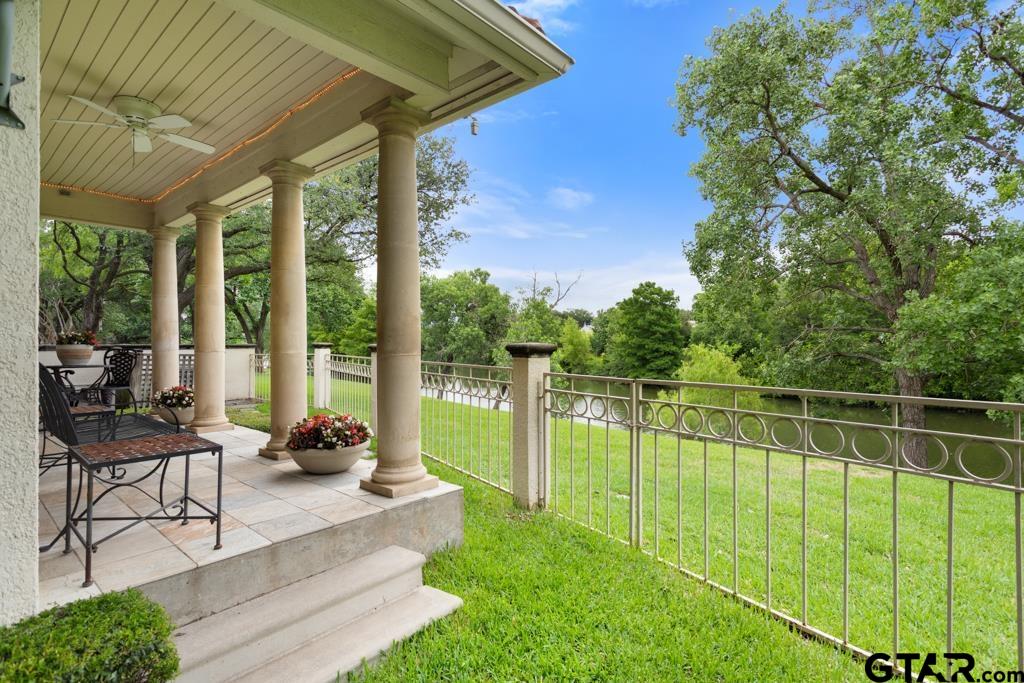 4608 North O'Connor Road Irving, TX 75062 - Photo 31 of 45 a view of a backyard with sitting area and floor to ceiling window