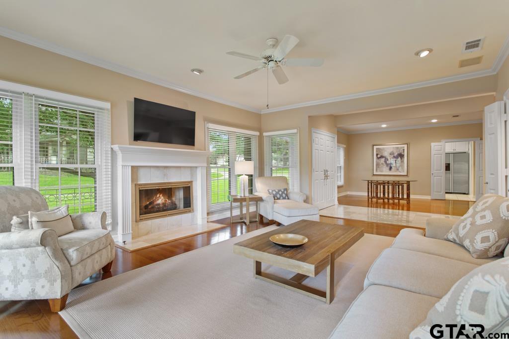 4608 North O'Connor Road Irving, TX 75062 - Photo 7 of 45 a living room with furniture fireplace and flat screen tv
