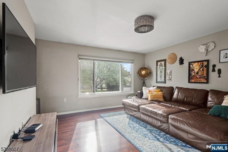 404-406 Chestnut Street Newark, NJ 07105 - Photo 11 of 27 a living room with furniture and a window