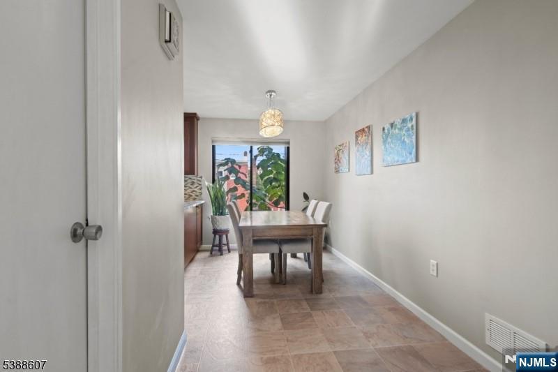 404-406 Chestnut Street Newark, NJ 07105 - Photo 19 of 27 a view of a livingroom with furniture and a window