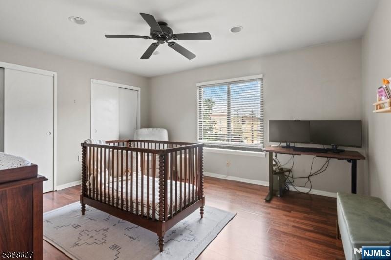 404-406 Chestnut Street Newark, NJ 07105 - Photo 22 of 27 a bedroom with a bed and a window