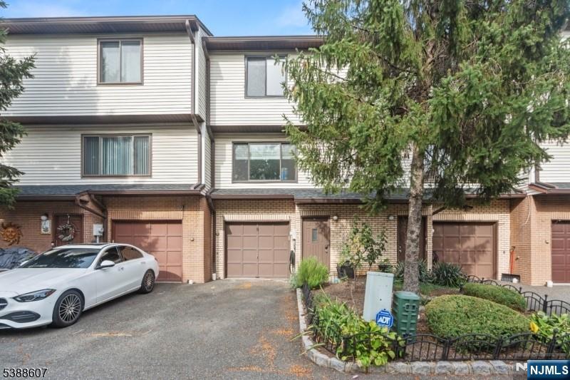 404-406 Chestnut Street Newark, NJ 07105 - Photo 25 of 27 a front view of a house with garden