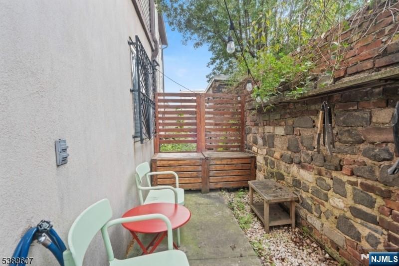 404-406 Chestnut Street Newark, NJ 07105 - Photo 6 of 27 a bathroom with a toilet and a shower