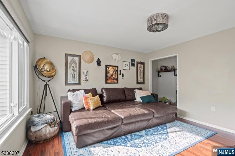 404-406 Chestnut Street Newark, NJ 07105 - Photo 10 of 27 a living room with furniture and a window