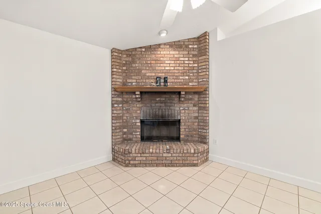 a view of a house with a yard and garage