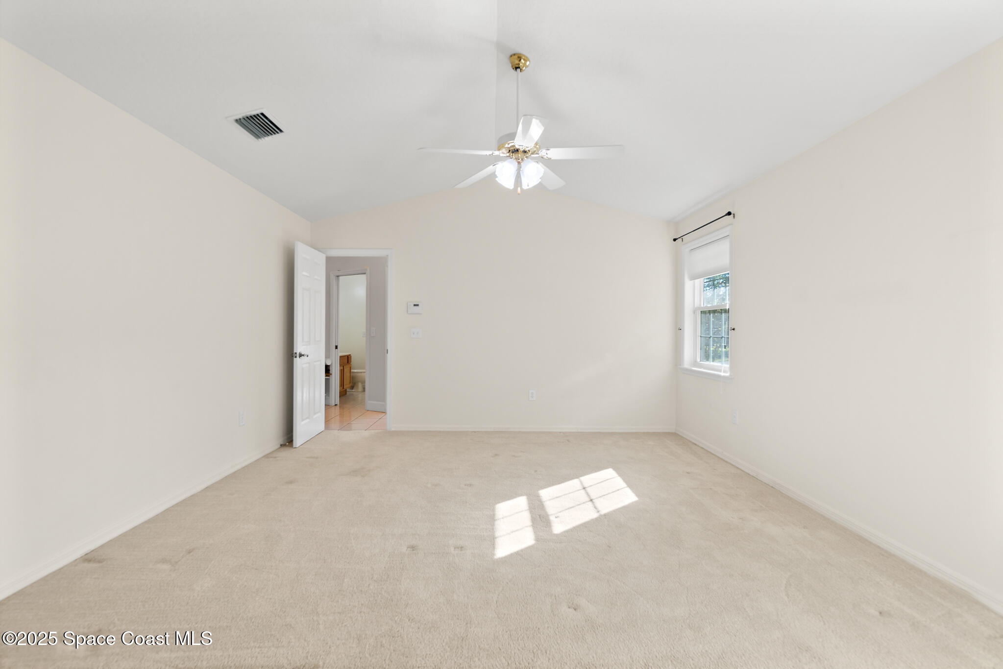 427 Hurst Road Northeast Palm Bay, FL 32907 - Photo 34 of 81 Primary Suite