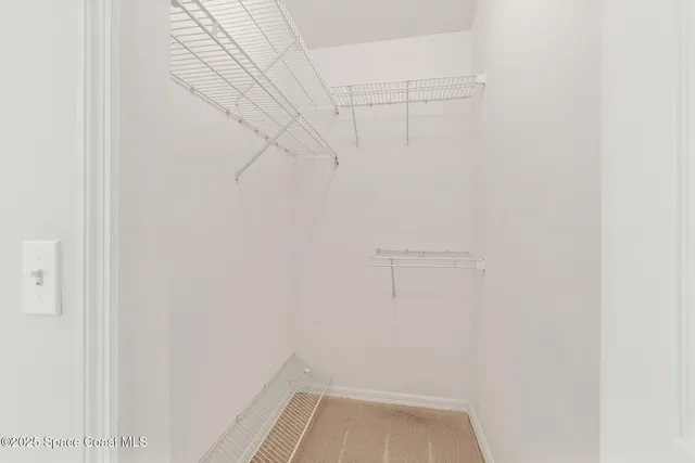 a view of a swimming pool with an outdoor space and seating area