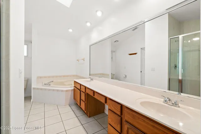 a swimming pool with outdoor seating and yard