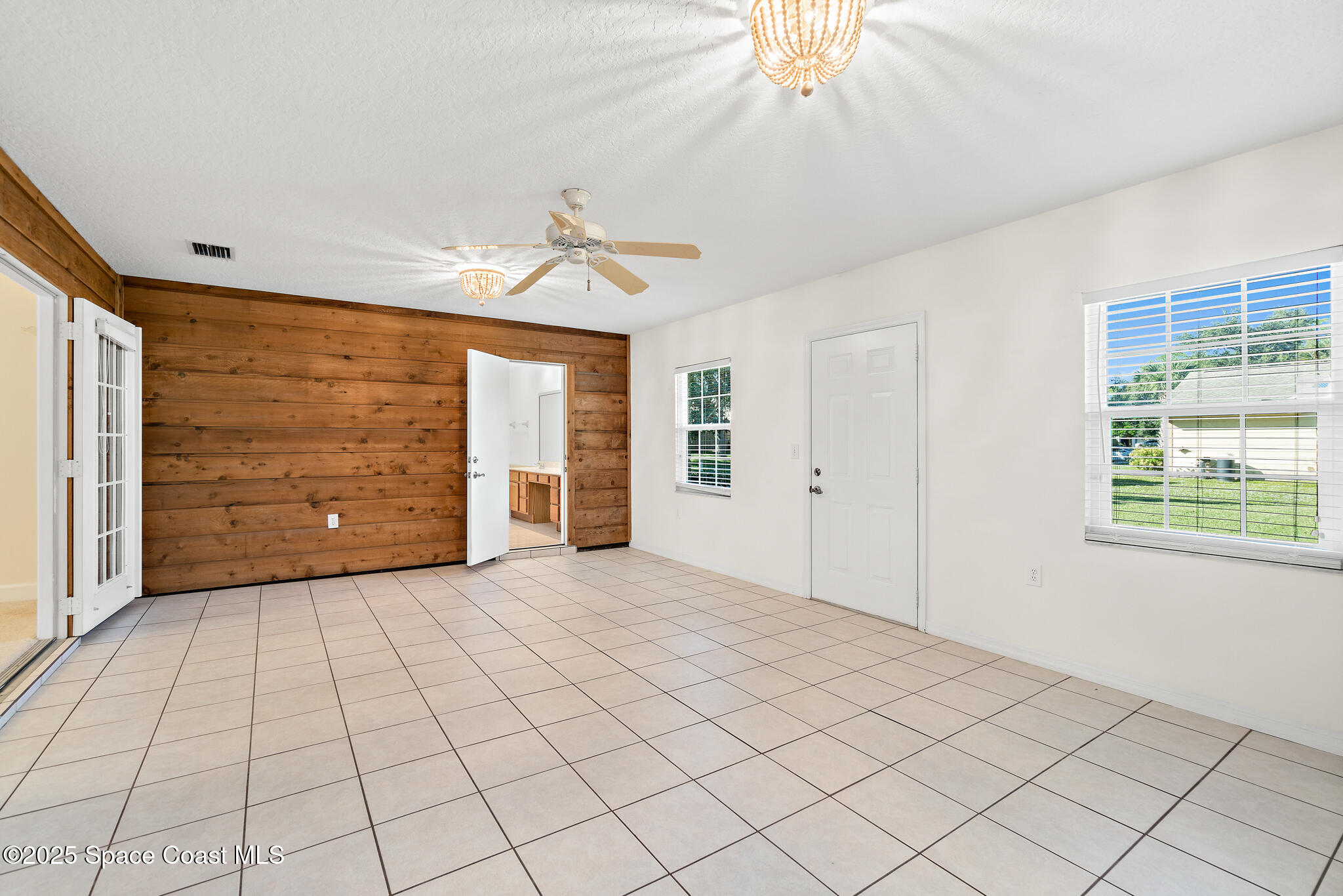 427 Hurst Road Northeast Palm Bay, FL 32907 - Photo 40 of 81 a view of an empty room with a window