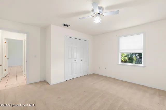 a view of a back yard of the house