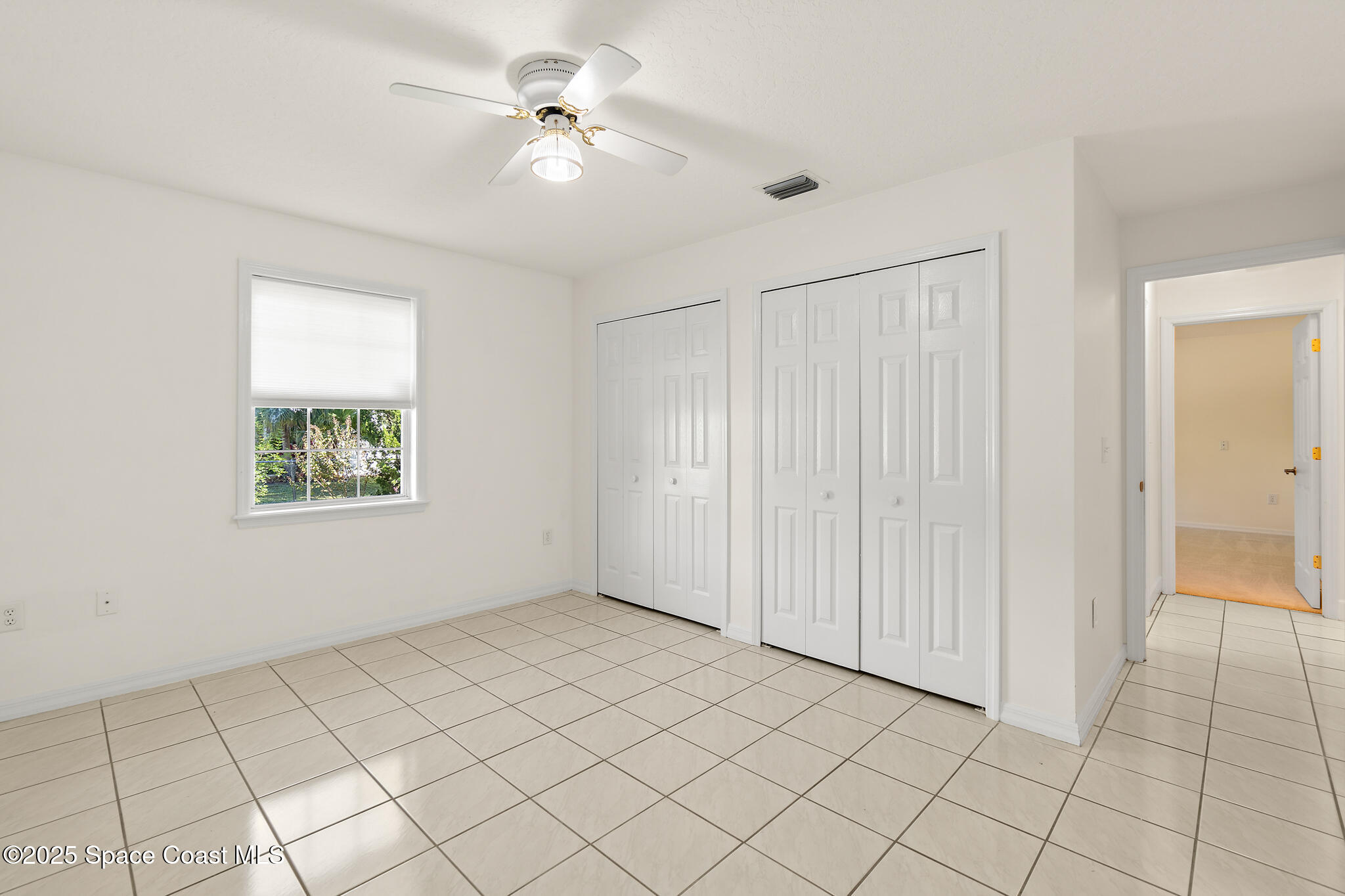 427 Hurst Road Northeast Palm Bay, FL 32907 - Photo 48 of 81 a view of an empty room and window