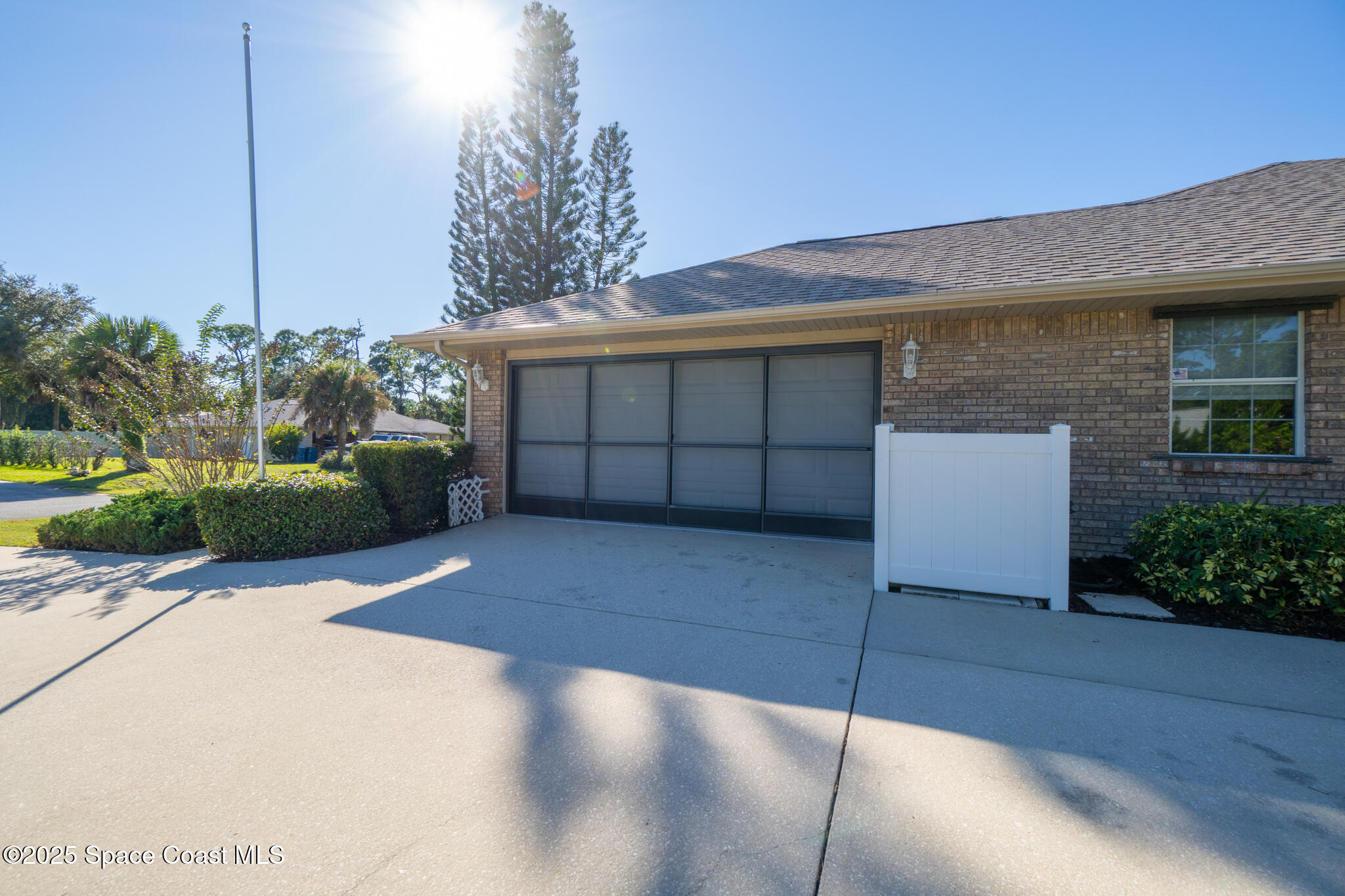 427 Hurst Road Northeast Palm Bay, FL 32907 - Photo 72 of 81 a view of a house with a garage