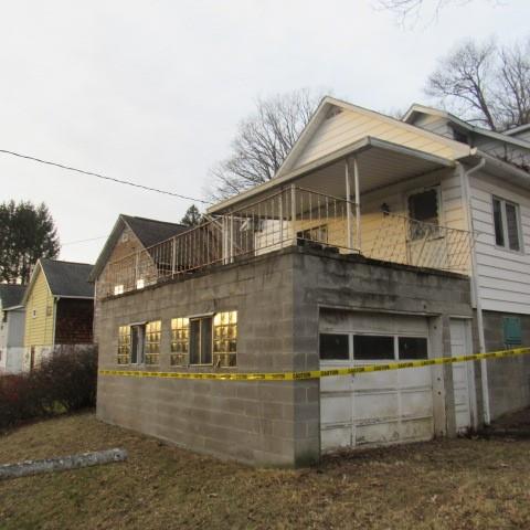 3097 Seanor Road Hollsopple, PA 15935 - Photo 3 of 15 a front view of a house with a yard