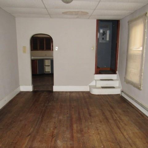 3097 Seanor Road Hollsopple, PA 15935 - Photo 7 of 15 an empty room with wooden floor and entrance