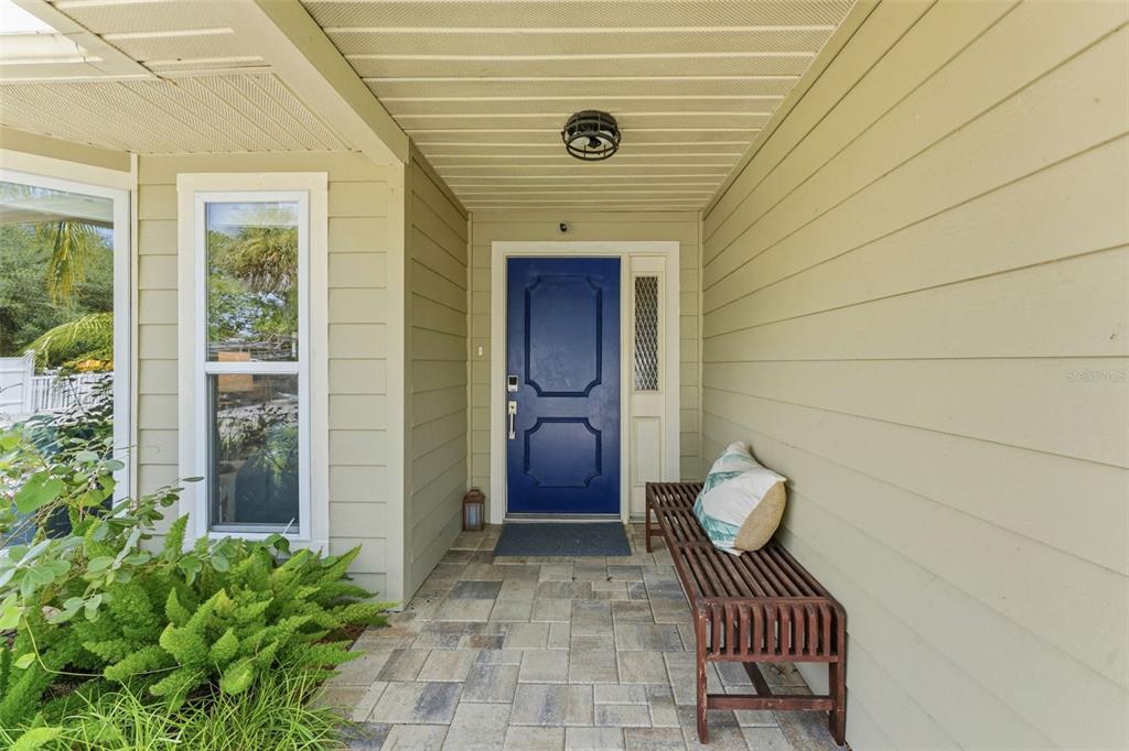 6355 Sebring Street Weeki Wachee, FL 34607 - Photo 9 of 65 a view of a door and chair in the patio