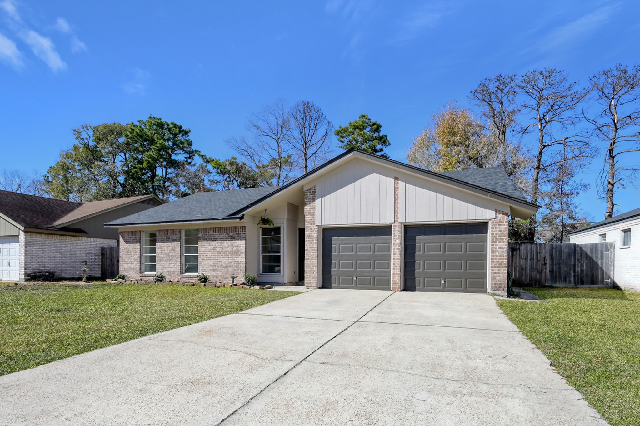 Completely renovated inside and out, this home has been updated with modern light fixtures, neutral walls, and vinyl plank flooring. Located in the Fox Run neighborhood of Spring, Texas.