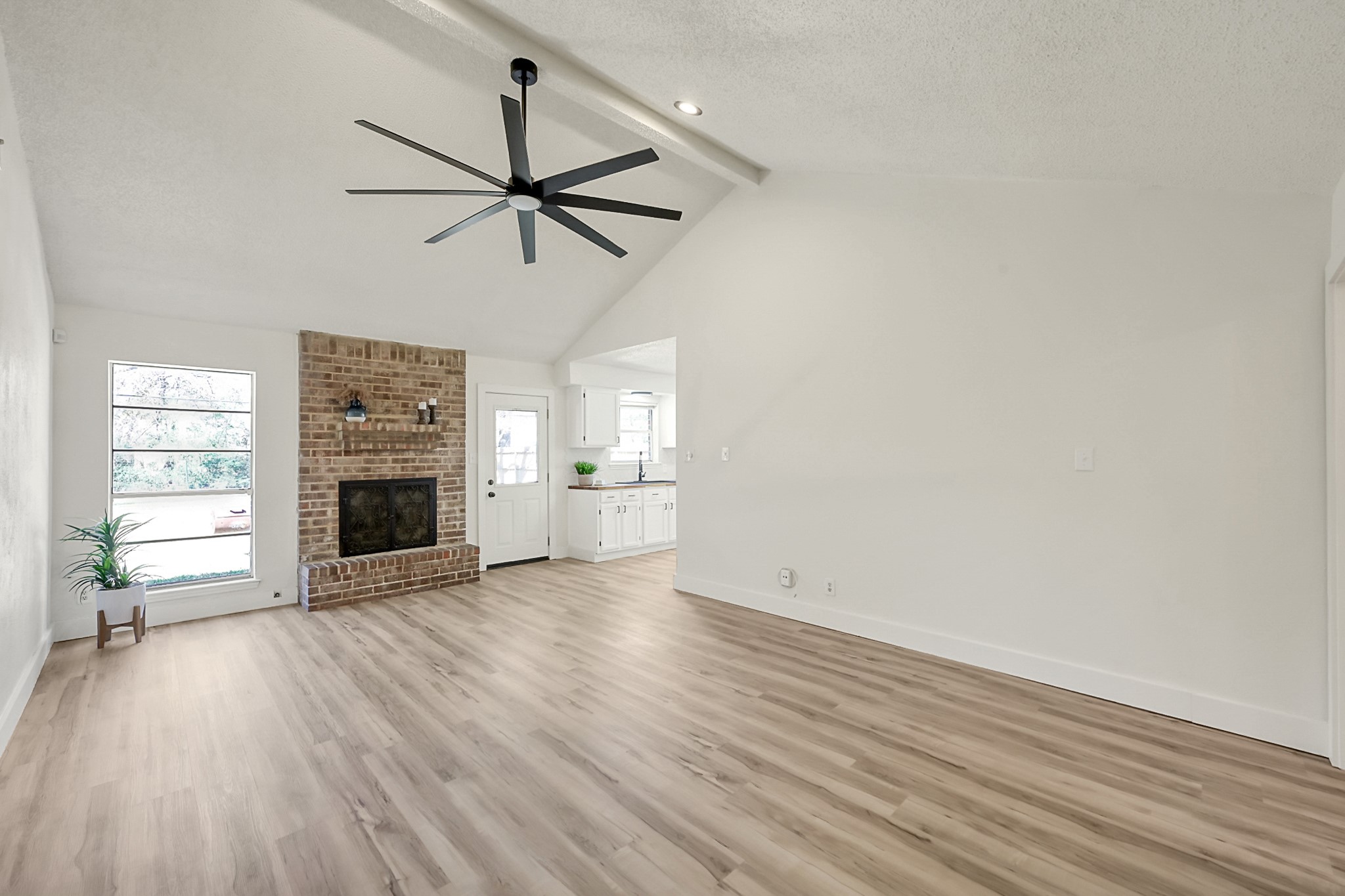 29615 Brookchase Drive Spring, TX 77386 - Photo 6 of 24 The open layout flows into a bright kitchen, perfect for entertaining.