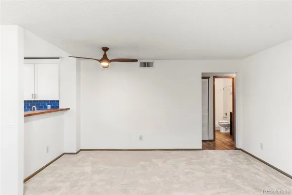 a view of a hallway with closet