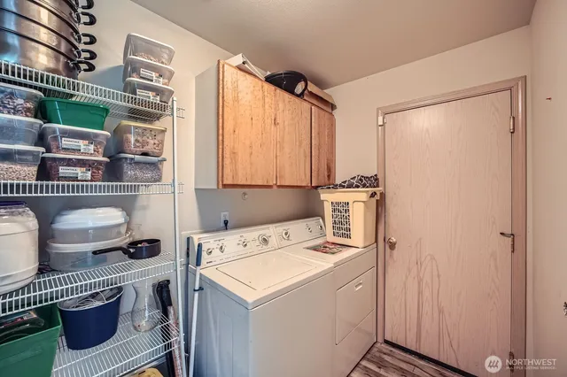 a utility room with dryer and washer