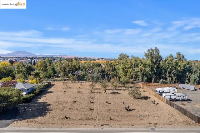 a view of a backyard of a house