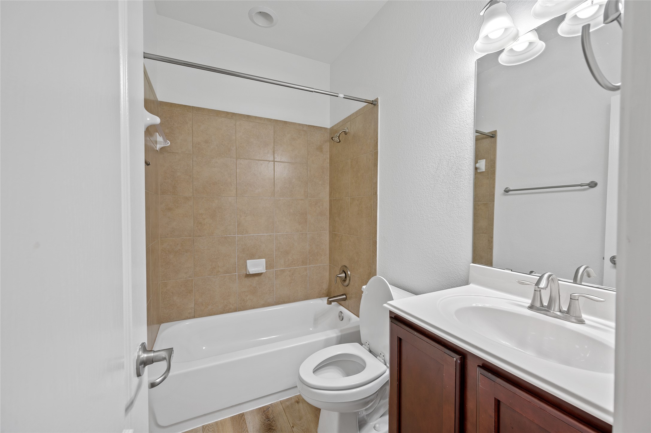 4512 Pyrenees Pass Bee Cave, TX 78738 - Photo 27 of 35 a bathroom with a sink a toilet and a bathtub