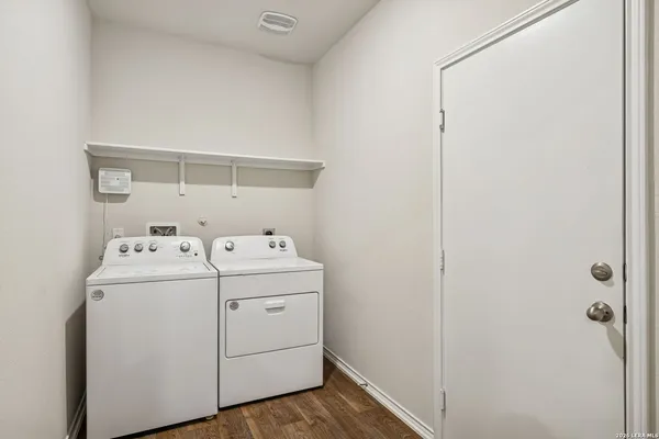 a utility room with dryer and washer