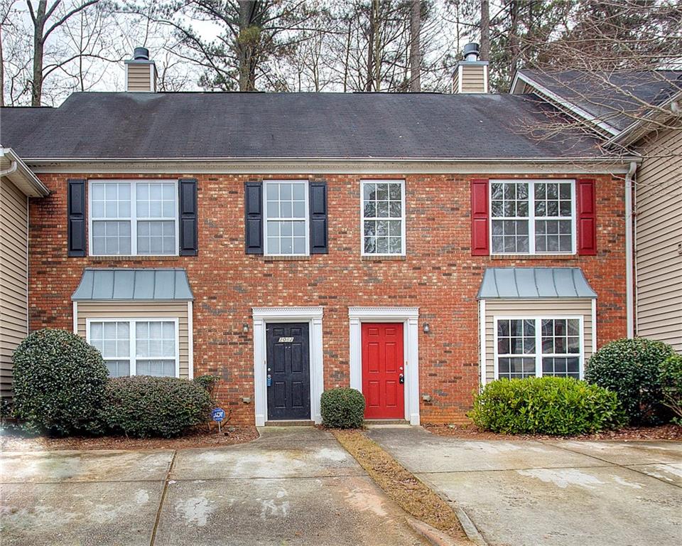 2082 Manhattan Parkway Decatur, GA 30035 - Photo 1 of 1 a front view of a house with a yard