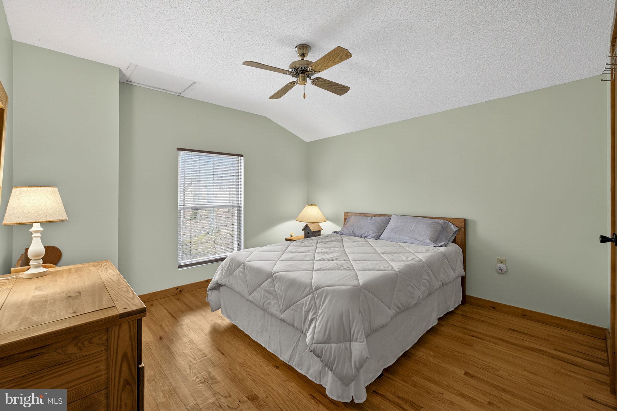 2368 Crossings View Road Paw Paw, WV 25434 - Photo 27 of 65 Upper bedroom 2 has lots of natural light, ceiling