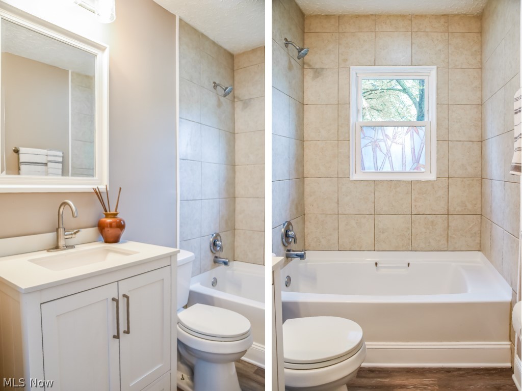 3271 Shellhart Road Norton, OH 44203 - Photo 11 of 14 Full bath on the main level with a new vanity and tile shower surround.