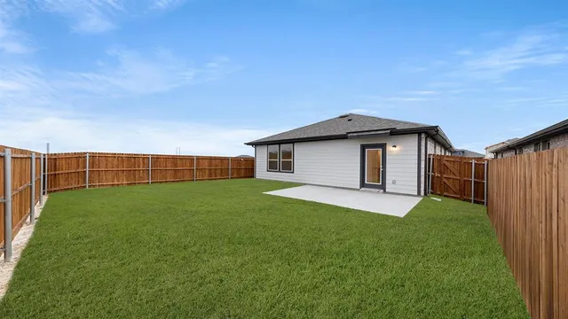 a view of a backyard with a garden