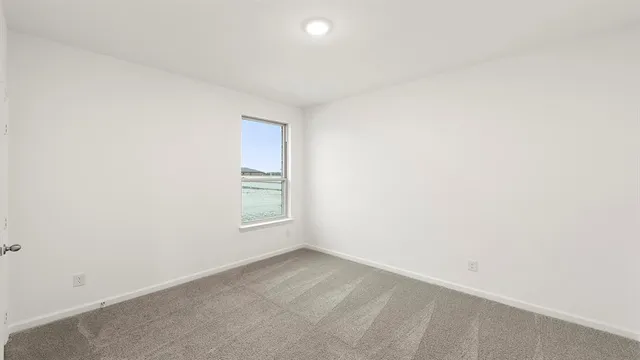 an empty room with a window