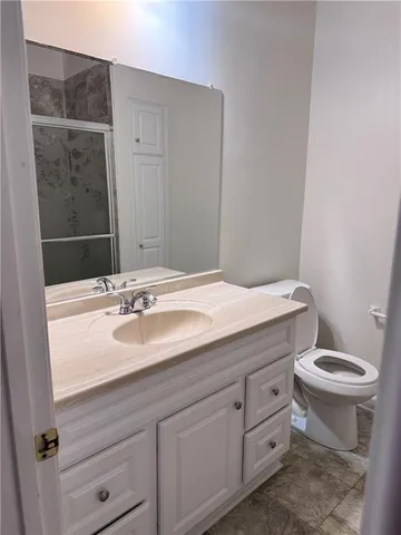 a bathroom with a sink and a toilet