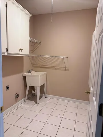 a room with a table and chairs