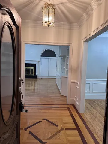 a view of a hallway with washer and dryer
