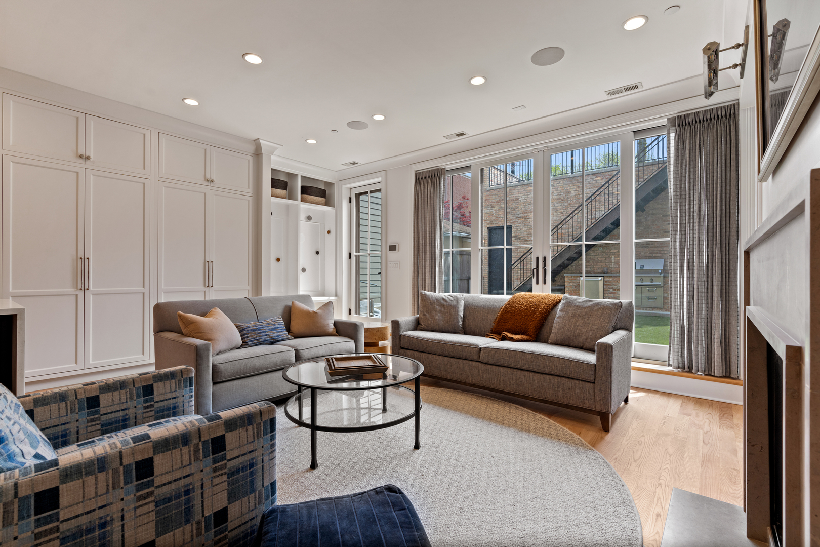 1025 West Altgeld Street Chicago, IL 60614 - Photo 12 of 41 a living room with furniture a large window and a fireplace