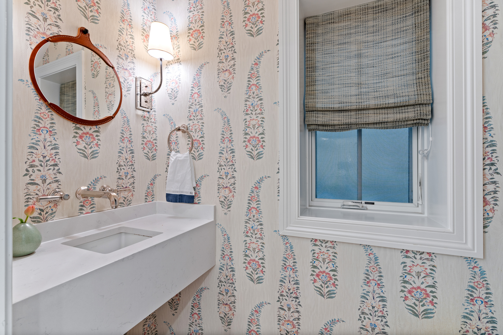 1025 West Altgeld Street Chicago, IL 60614 - Photo 16 of 41 a bathroom with a sink and a mirror