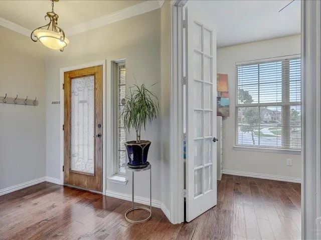 a view of livingroom and hardwood floor