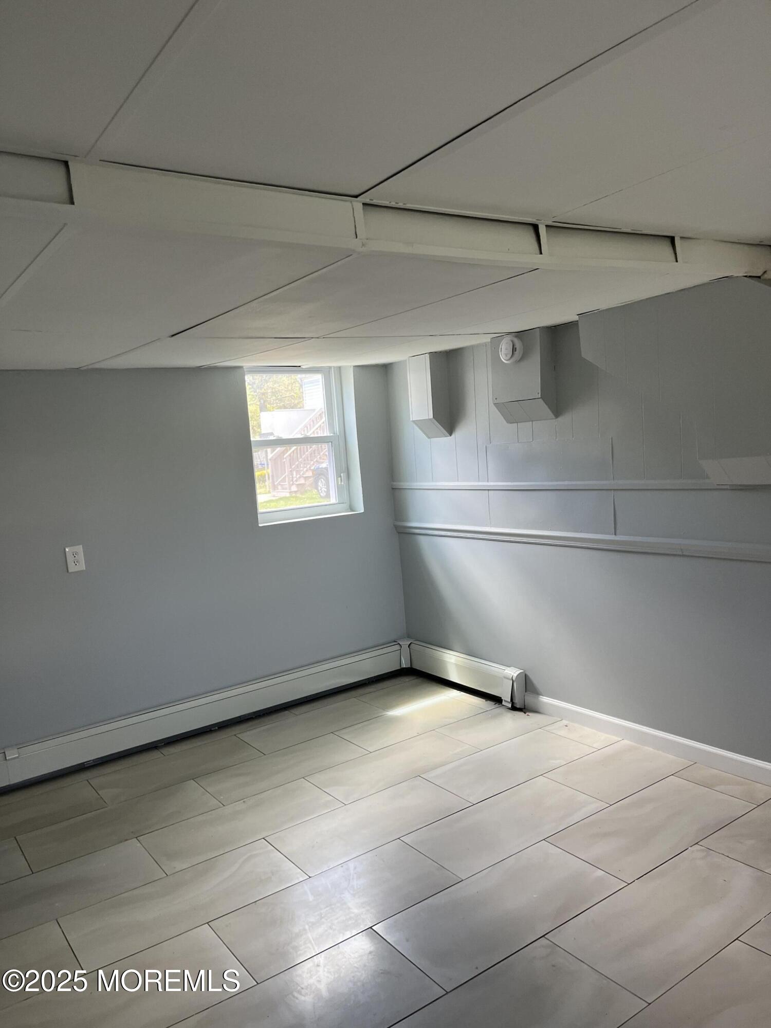 140 Main Street Helmetta, NJ 08828 - Photo 5 of 5 a view of an empty room with a window
