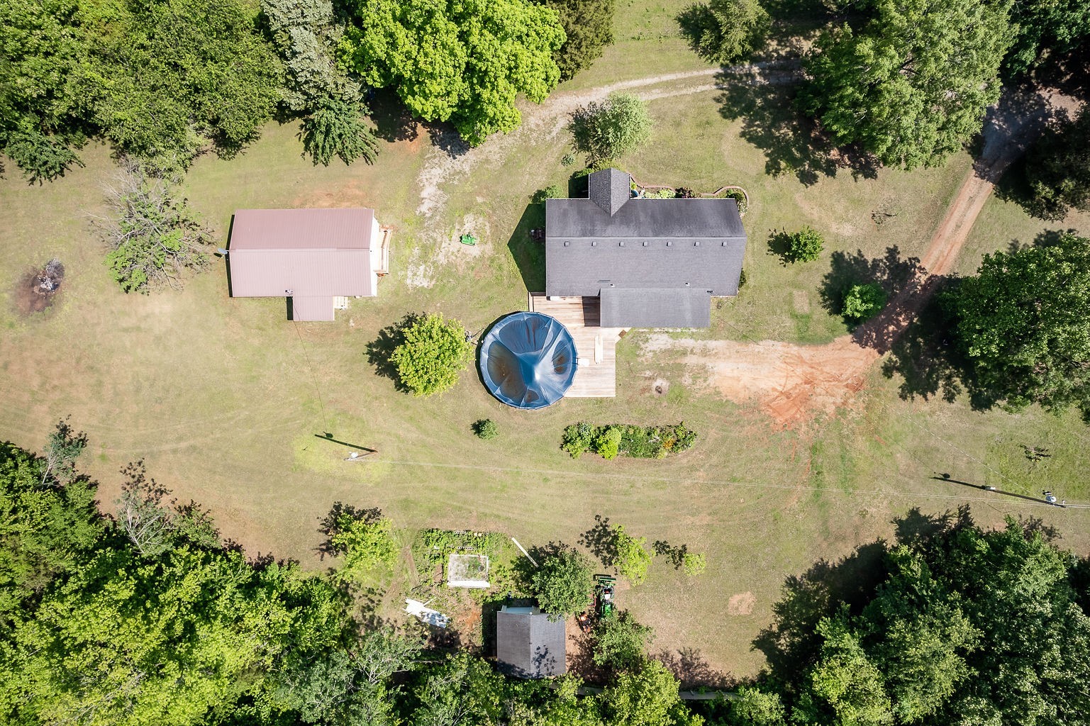 655 River Road Morrison, TN 37357 - Photo 3 of 53 an aerial view of a house with a swimming pool