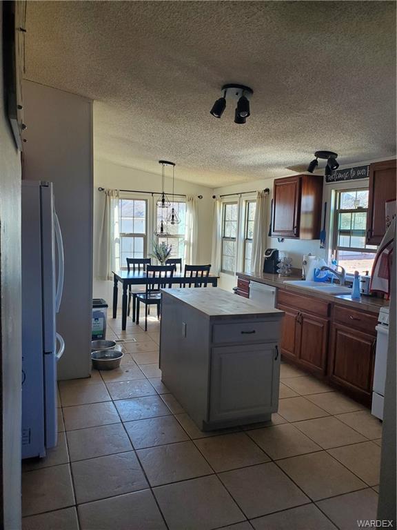 2277 Egar Road Golden Valley, AZ 86413 - Photo 8 of 28 a kitchen with a sink and cabinets