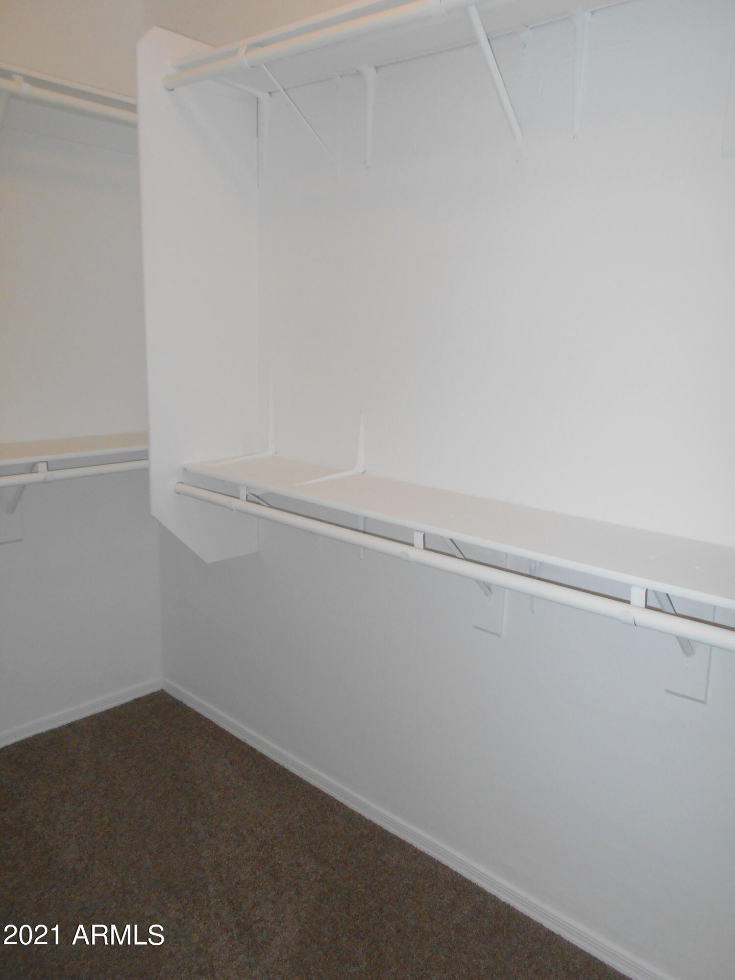 9434 West Berkeley Road Phoenix, AZ 85037 - Photo 17 of 25 MASTER CLOSET