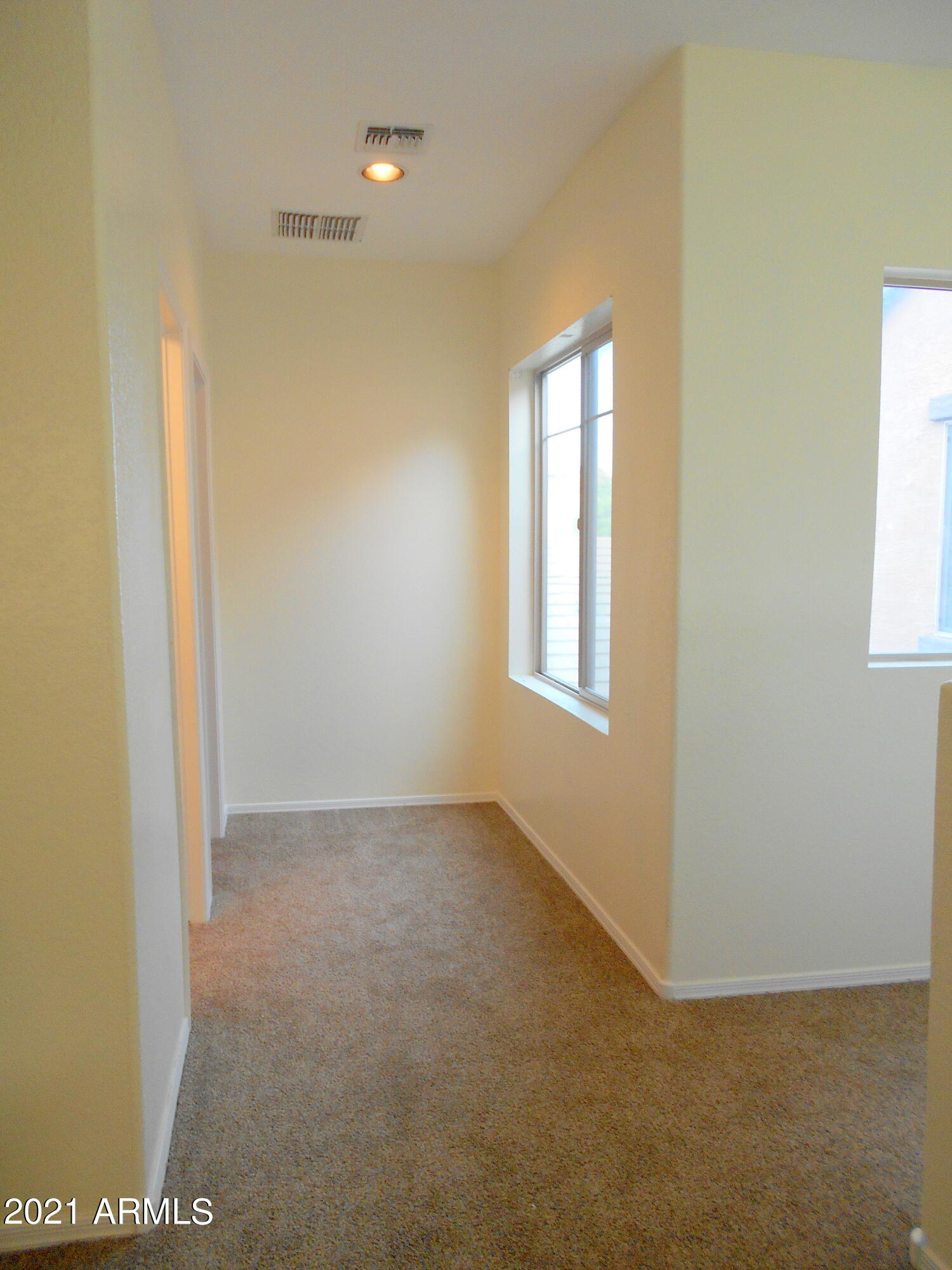 9434 West Berkeley Road Phoenix, AZ 85037 - Photo 19 of 25 HALLWAY TO BEDROOM 3